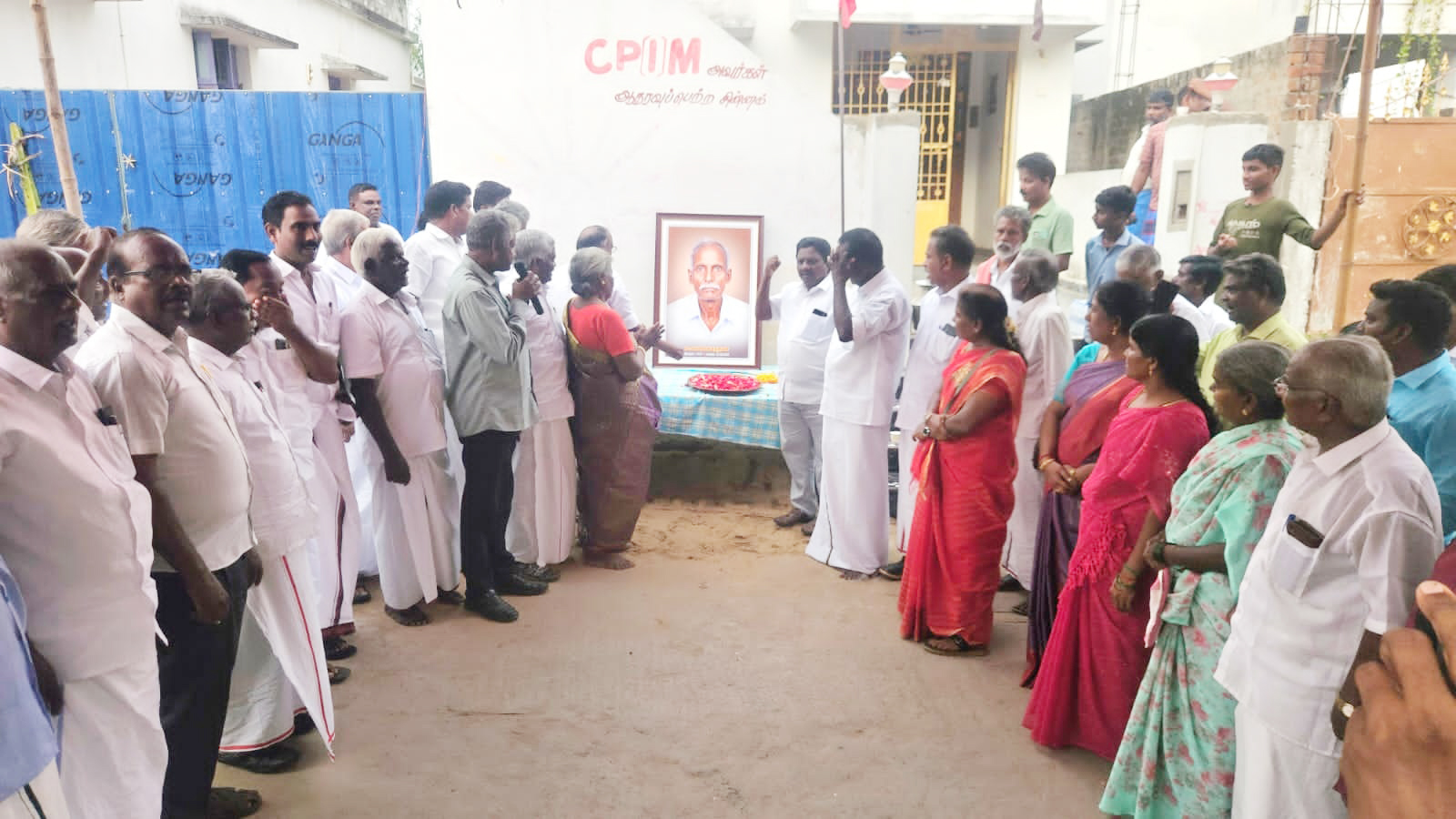 தோழர் மா.கலிவரதன் படத்திறப்பு விழா காரப்பட்டில் திரளானோர் பங்கேற்பு